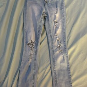 Women's Light Blue Distressed Jeans